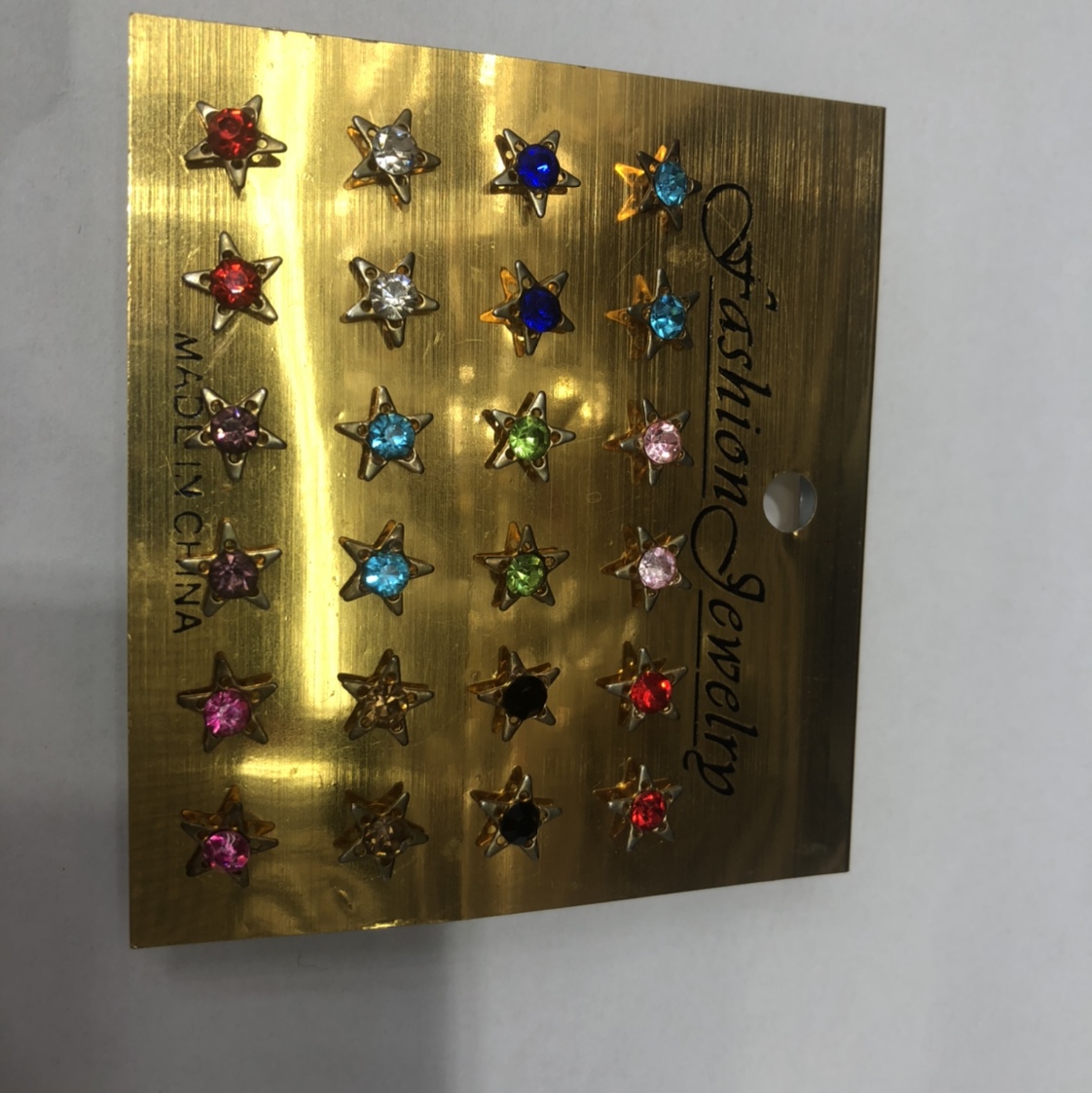 Mini star stud earrings thumbnail