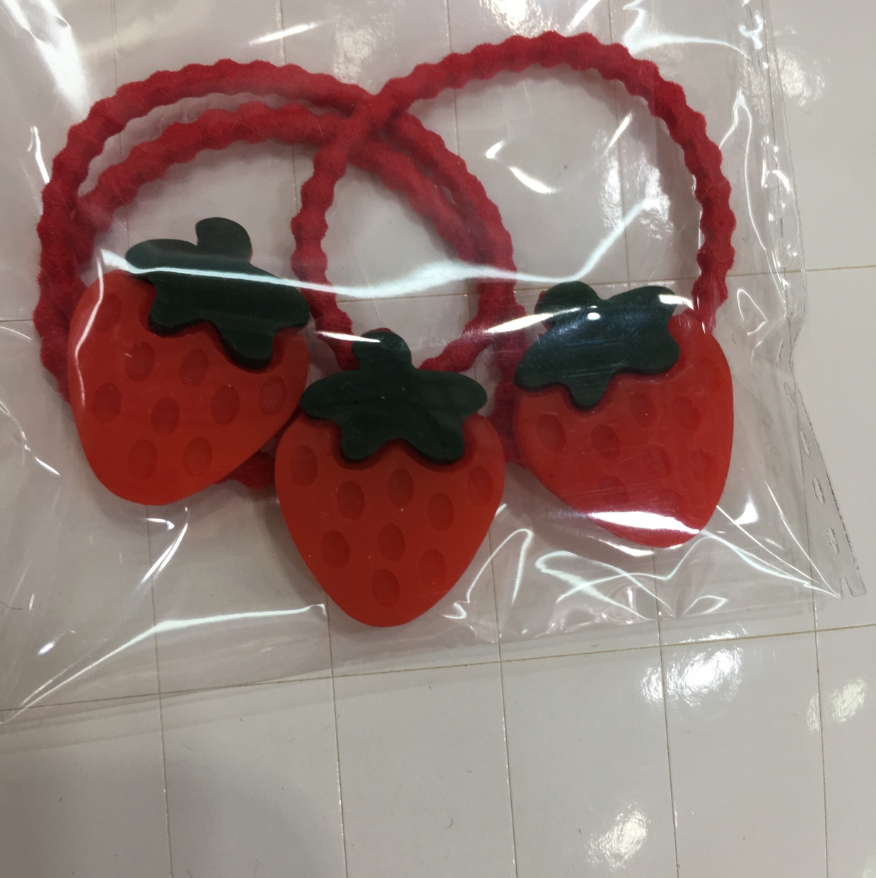 45：草莓皮筋系列（随机同系列混款混色发货1卡10小袋，10卡/包）