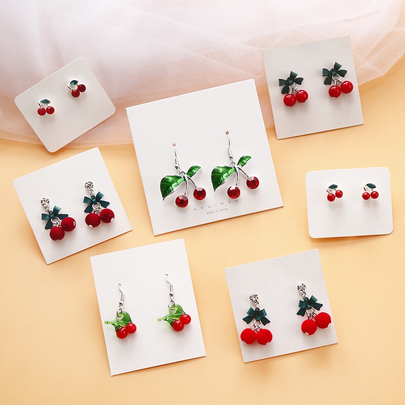 Korean creative cherry earrings red fire New Year earrings, bow-tie, hair balls, pearl cherries, Chinese New Year bride earrings thumbnail