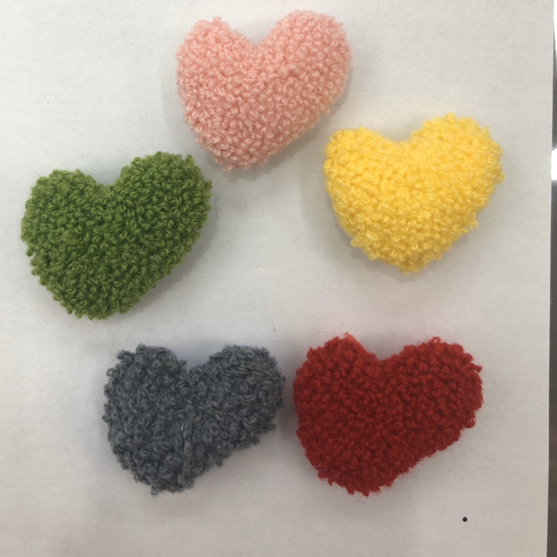Cute little hearts made of wool