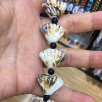 Ceramic fan shaped beads