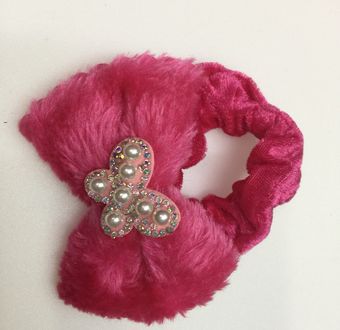 A hairy butterfly bow tie around the head