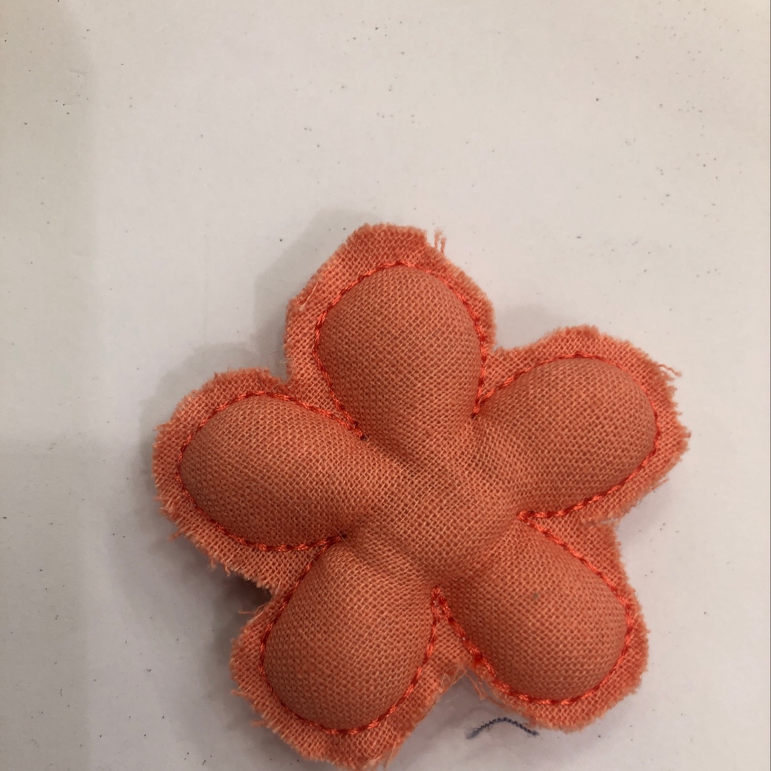 A single-color five-petal flower on cotton fabric details Picture