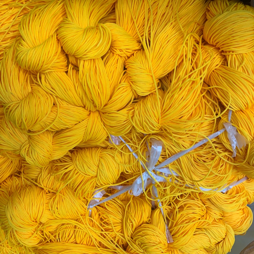 200D of thread, a dozen of about 9000 (golden yellow) thumbnail