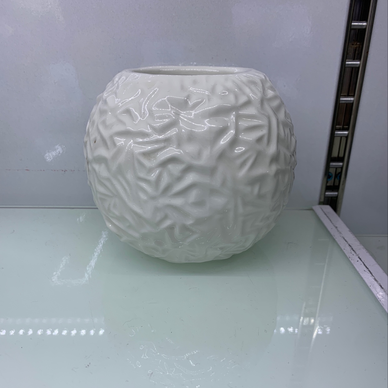 A delicate and simple white vase