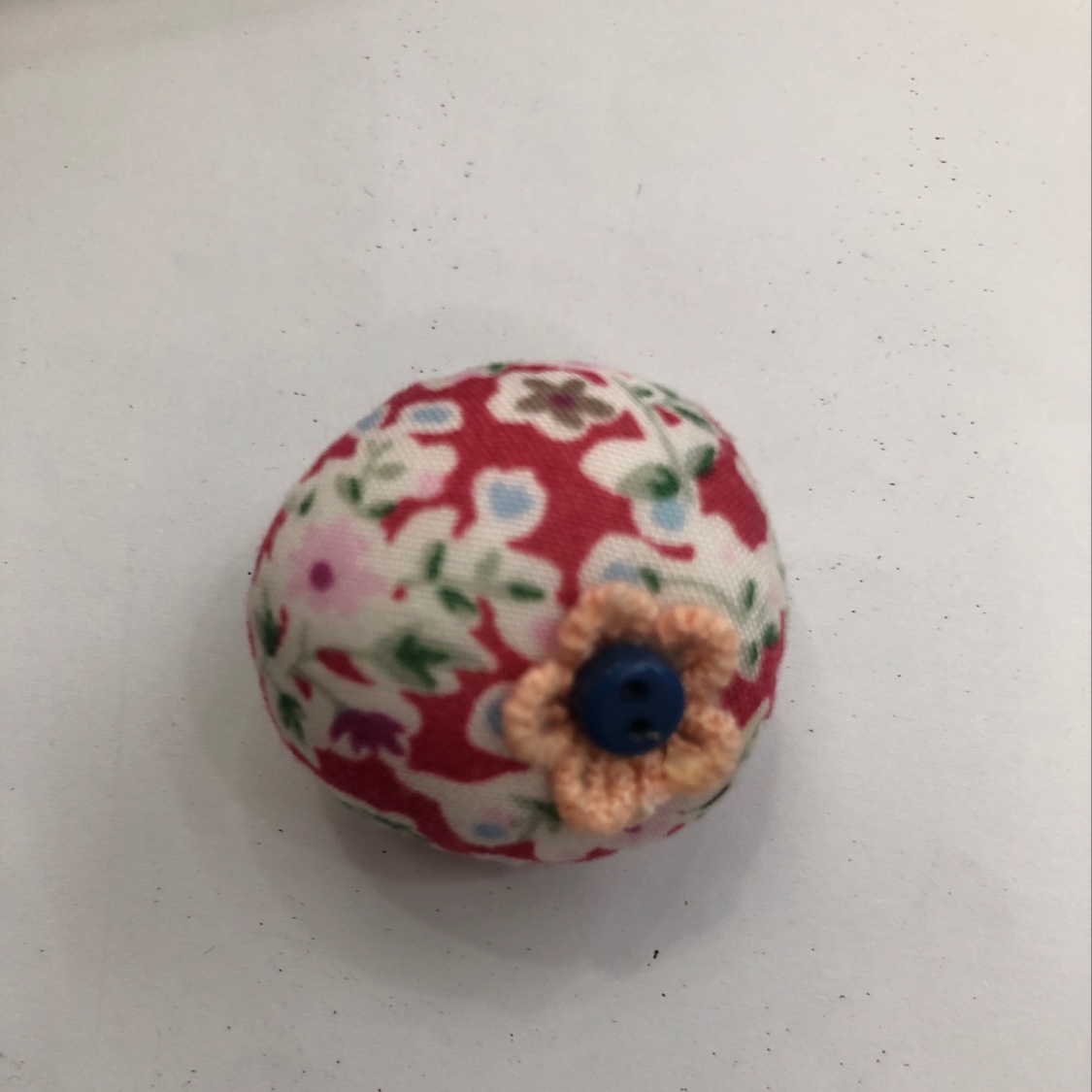 Cute little round ball with floral cloth details Picture