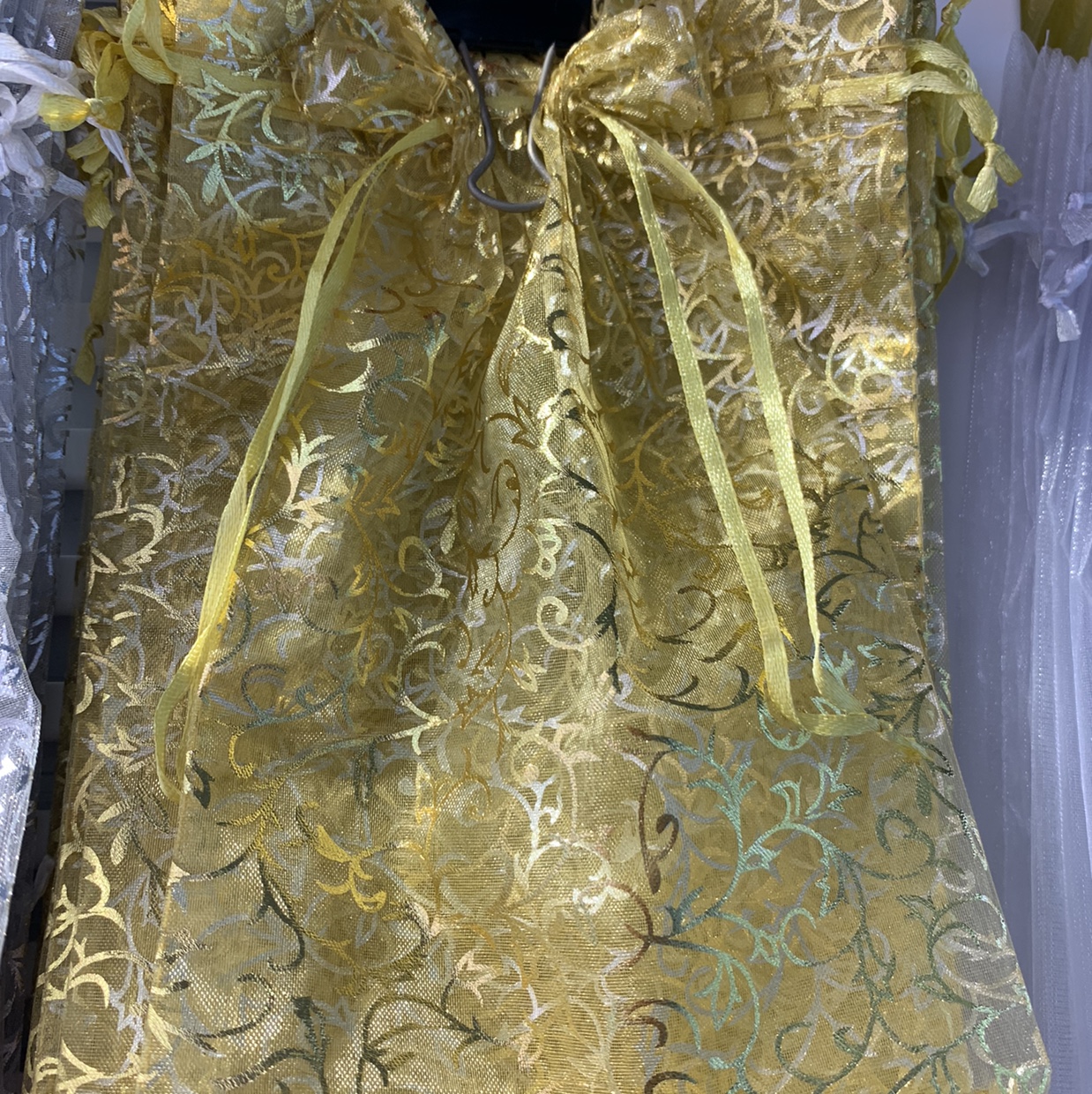 Gold-embossed gauze pocket undefined
