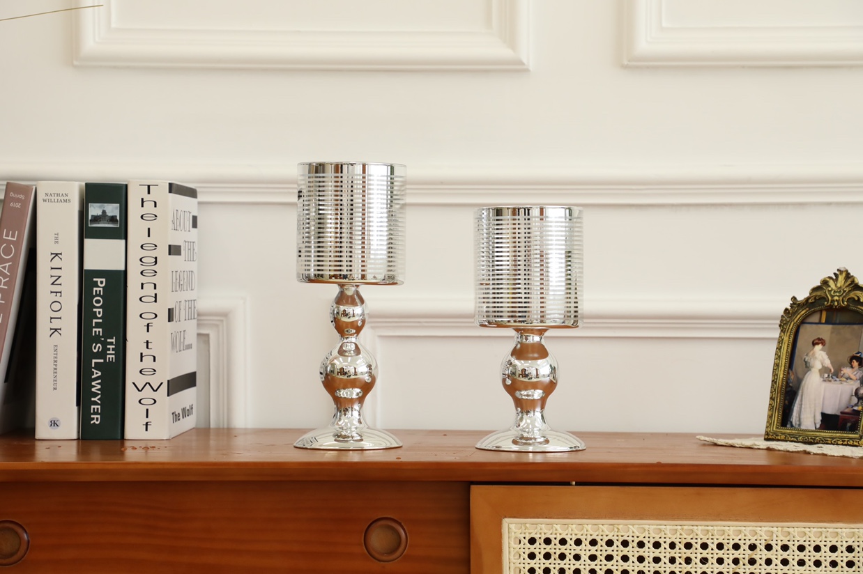 The tall candlestick is in gold and silver Specification image