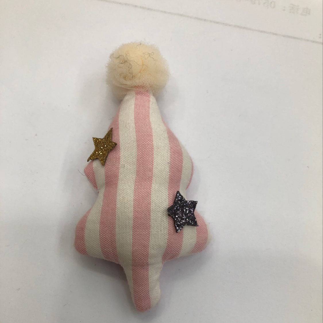 A striped fabric tree with small balls details Picture