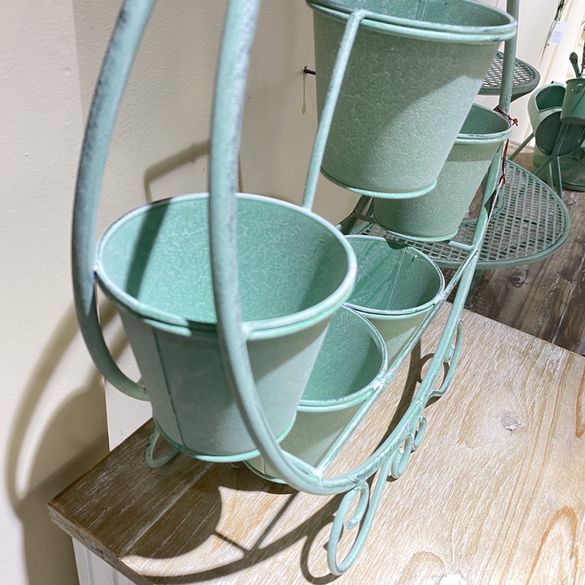 Green flower arrangement bucket Item Picture