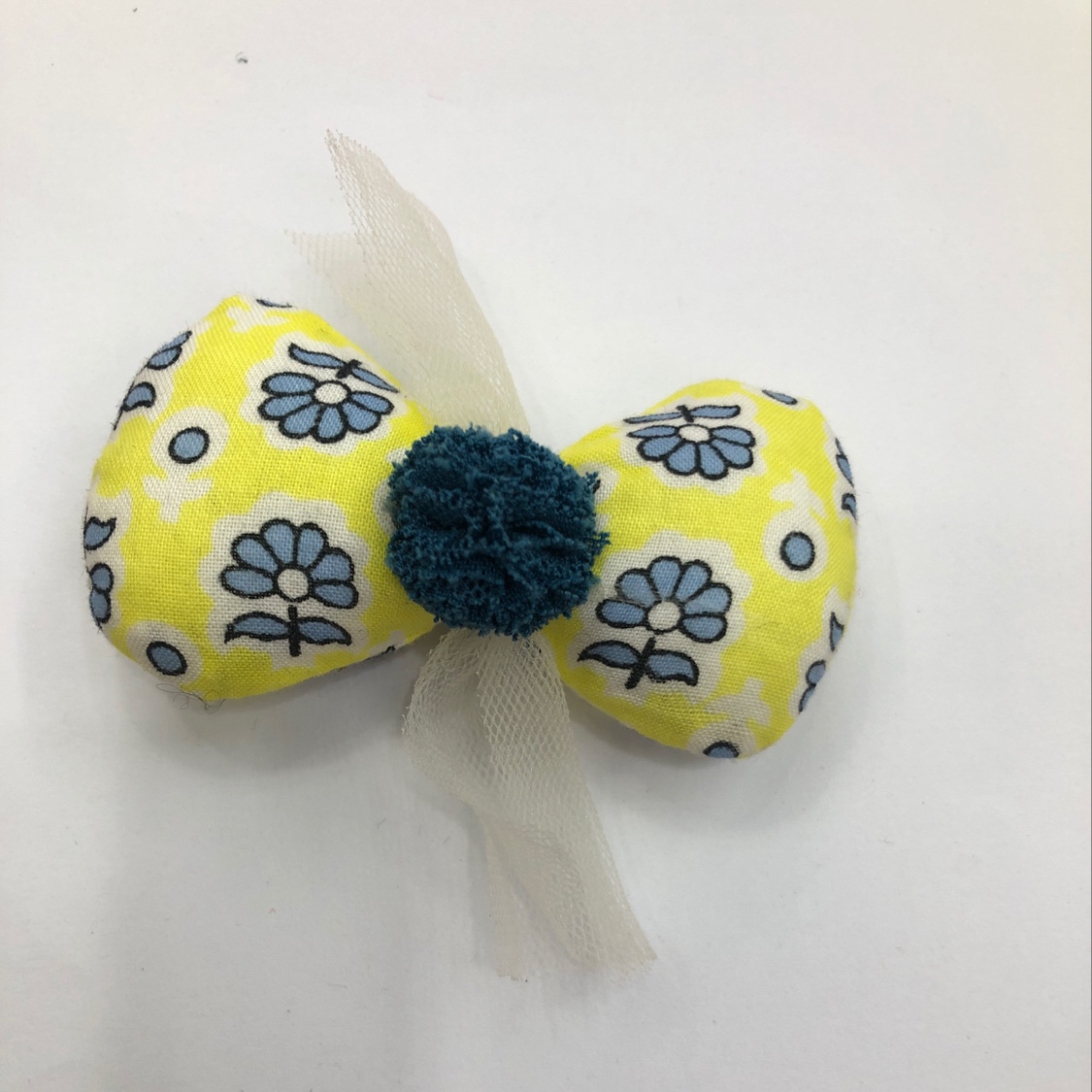 Floral fabric with cotton-padded bow ties and small balls details Picture