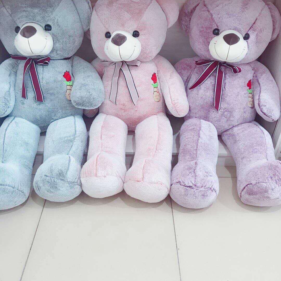 Stuffed toy rose ribbon bear