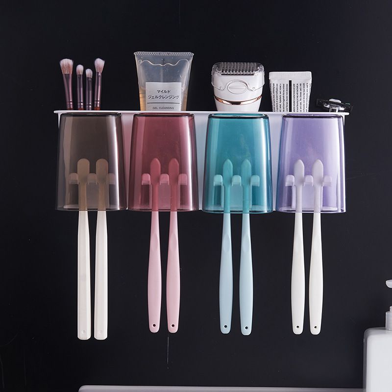 Direct selling creative toothbrush holder household plastic thickened cup non-punch suction wall mouthwash cup set Application Scenario