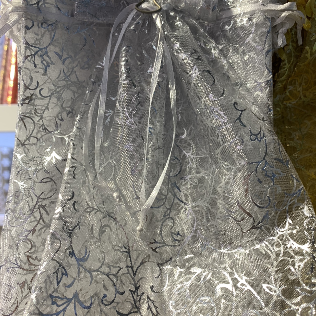 Gold-embossed gauze pocket undefined