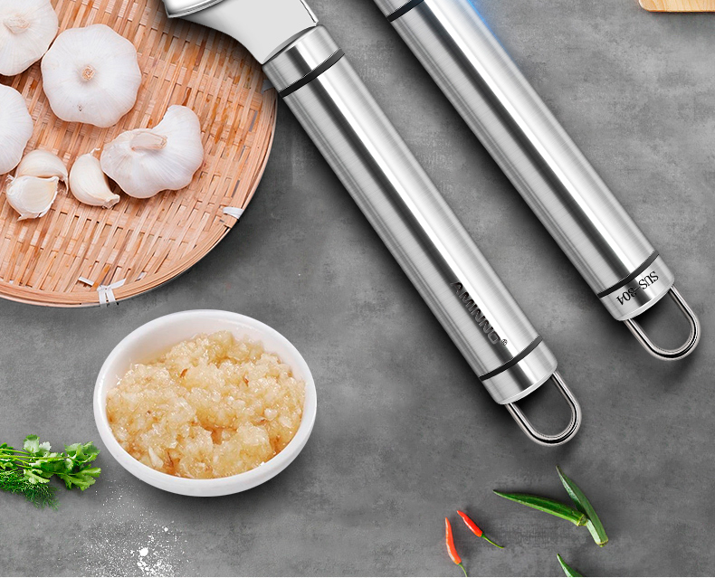 Emino kitchenware garlic press detail image 2