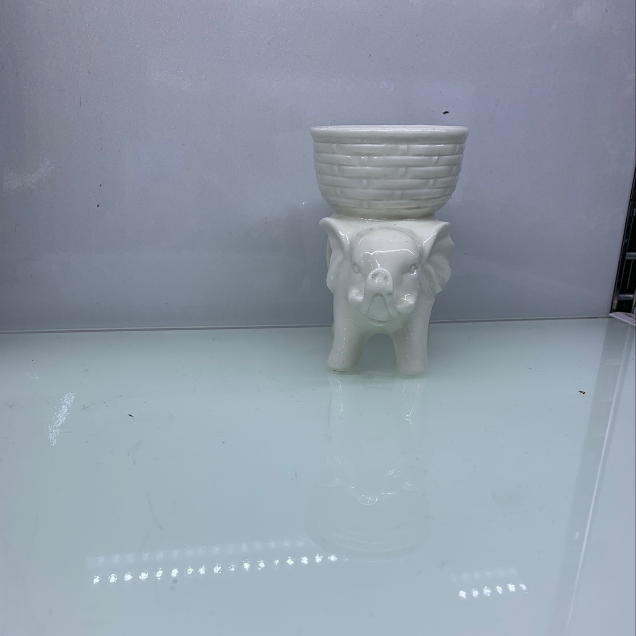 Small white elephant candlestick