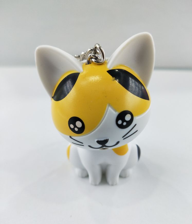 New Cheese cat keychain pendant, glowing and making sounds Application Scenario
