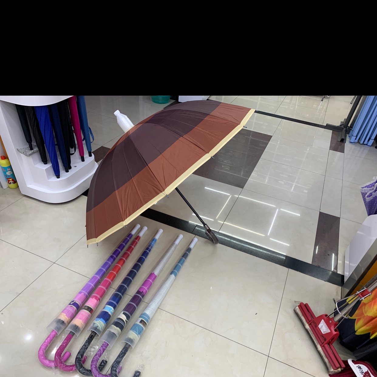 67×16K格挡包边防水套晴雨两用直杆伞