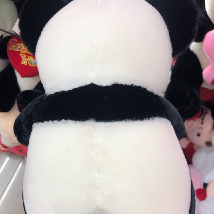 A 30cm panda hugging its heart with embroidered letters Application Scenario