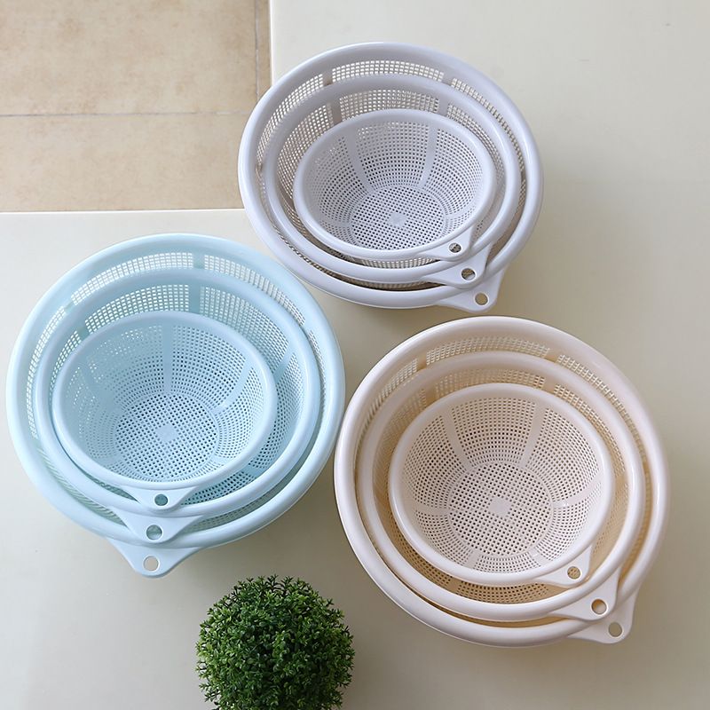 Direct-sale round vegetable washing baskets, vegetable draining sieve sets, kitchen vegetable washing basins, fruit draining storage baskets, plastic baskets Application Scenario