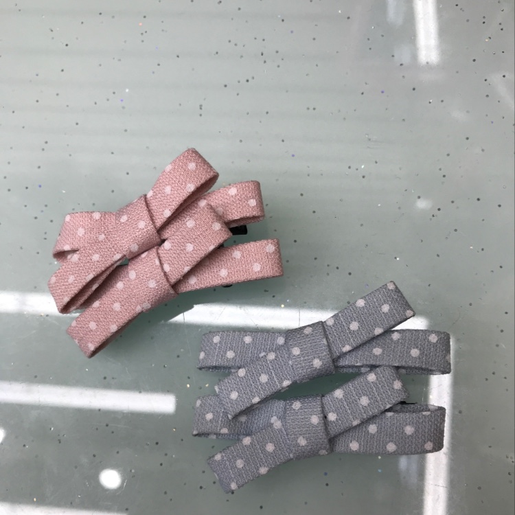 Korean version of fashionable cross - cloth bow pair clip
