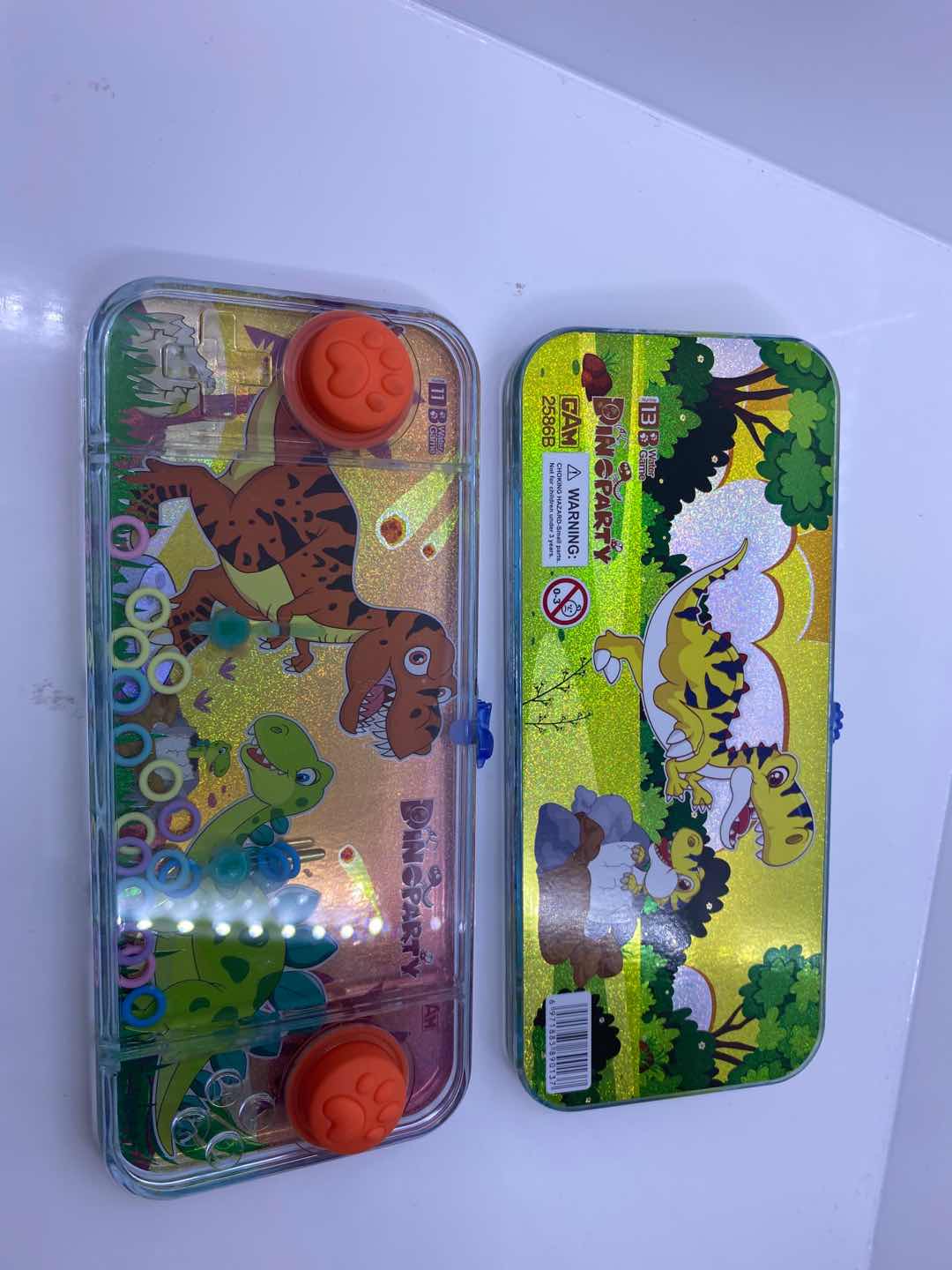 经典套圈游戏机双按键镭射透明水机恐龙系列产品图