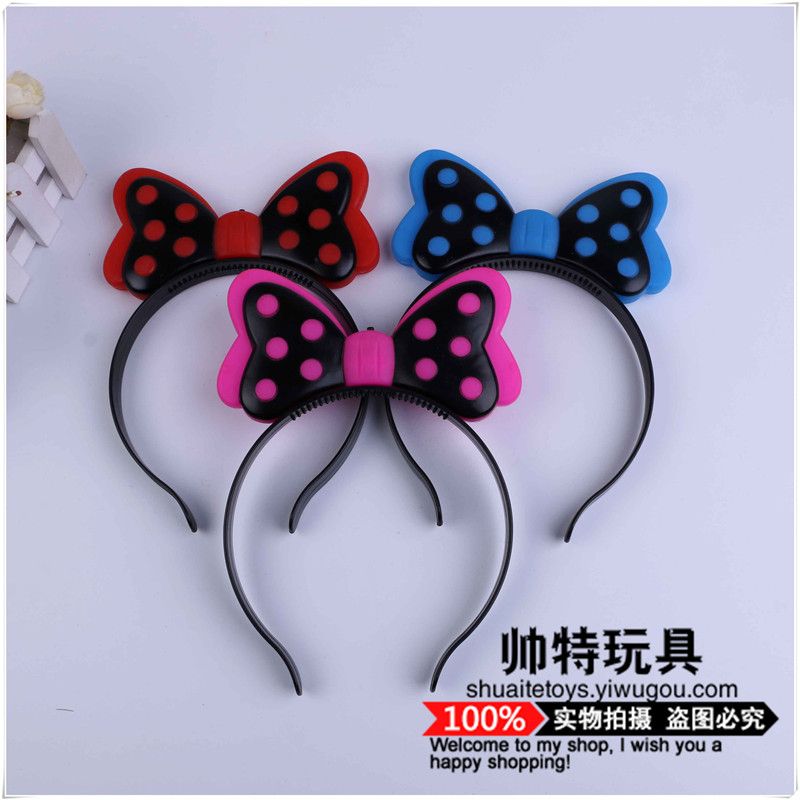 Black background bow flash headband with light