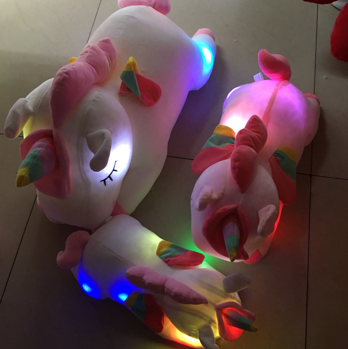 Plush toy figurines, dolls, and glowing unicorns are excellent gifts
