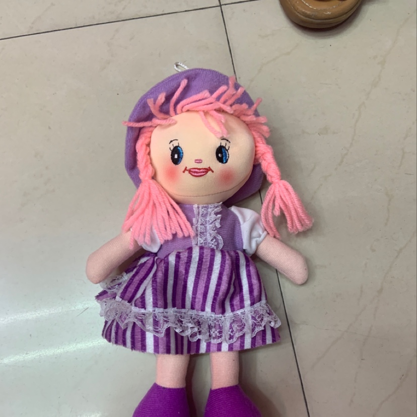 A plush toy with purple stripes thumbnail