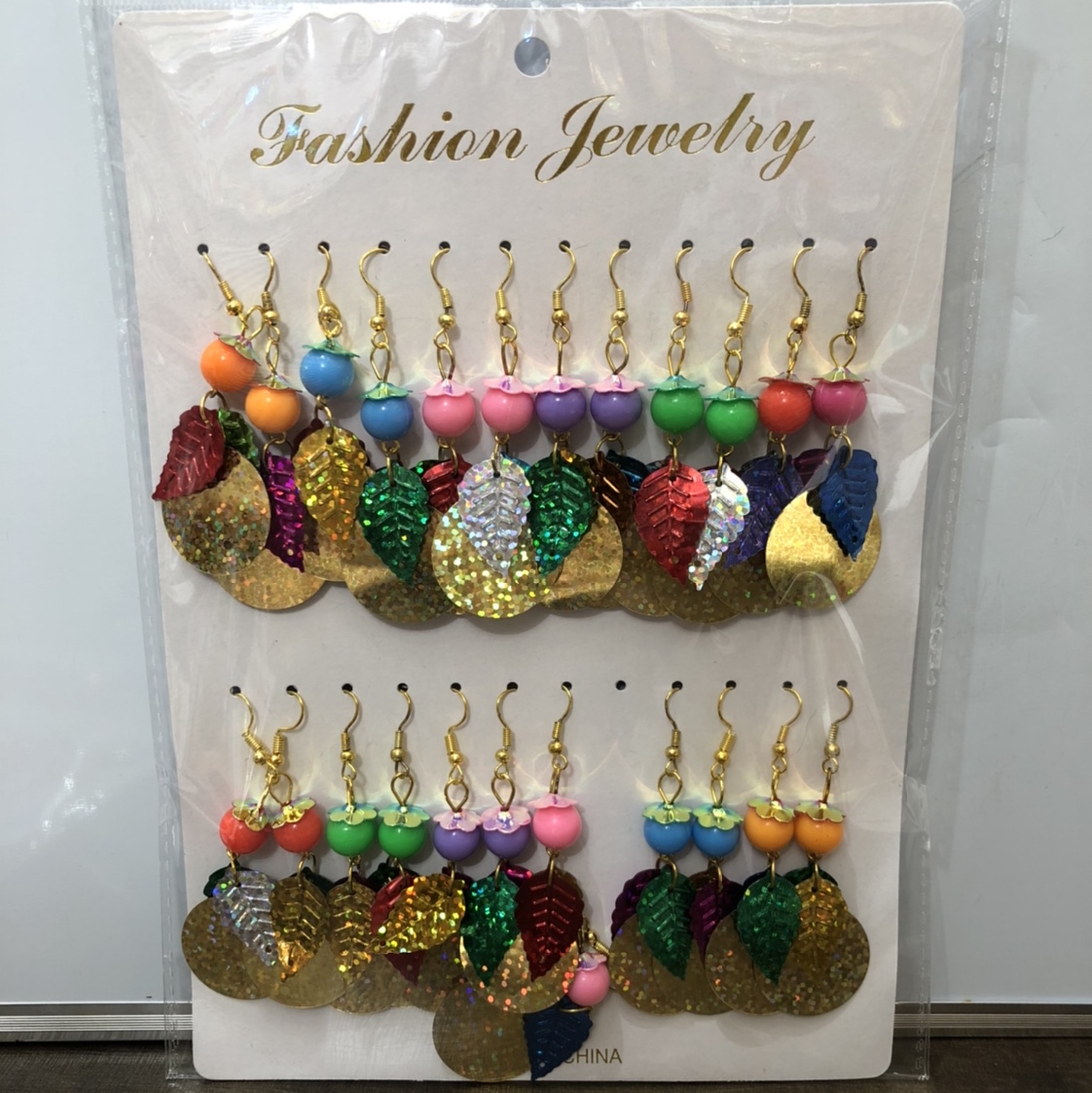Large paper card for sequin earrings. thumbnail