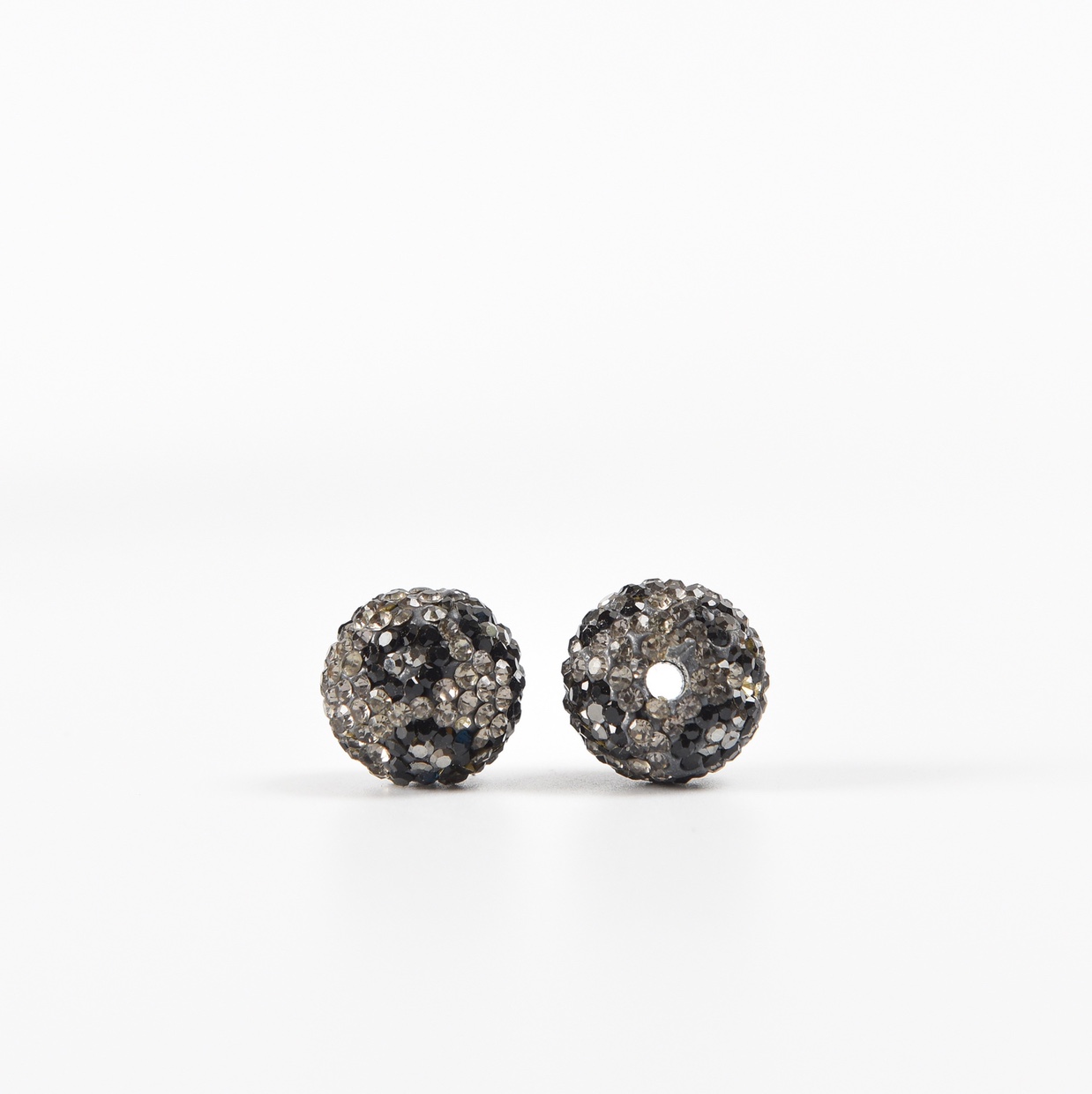 The 16mm leopard-print clay balls come in both large and small holes. undefined