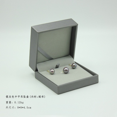 A silver - grey flat locket thumbnail
