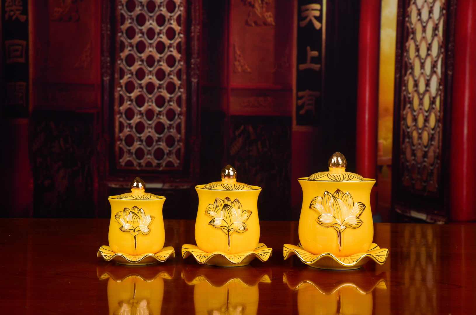 Auspicious Buddhist utensils: Yellow gilded small, medium and large cups