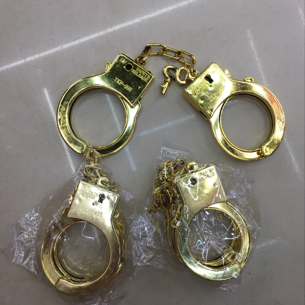 Plastic handcuffs gold thumbnail