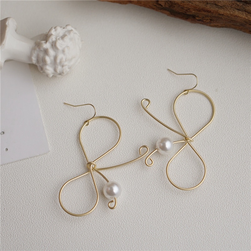 新款时尚气质蝴蝶结镶珍珠耳环气质耳环图