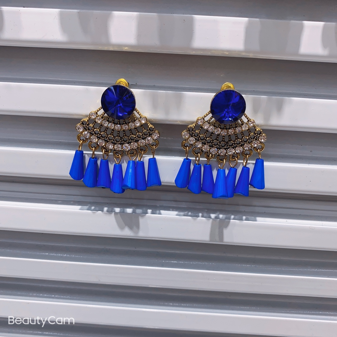2020 new European and American foreign trade exaggerated earrings big brand Bohemian vintage hollow-out earrings sapphire blue hanging in the same color small conical earrings thumbnail