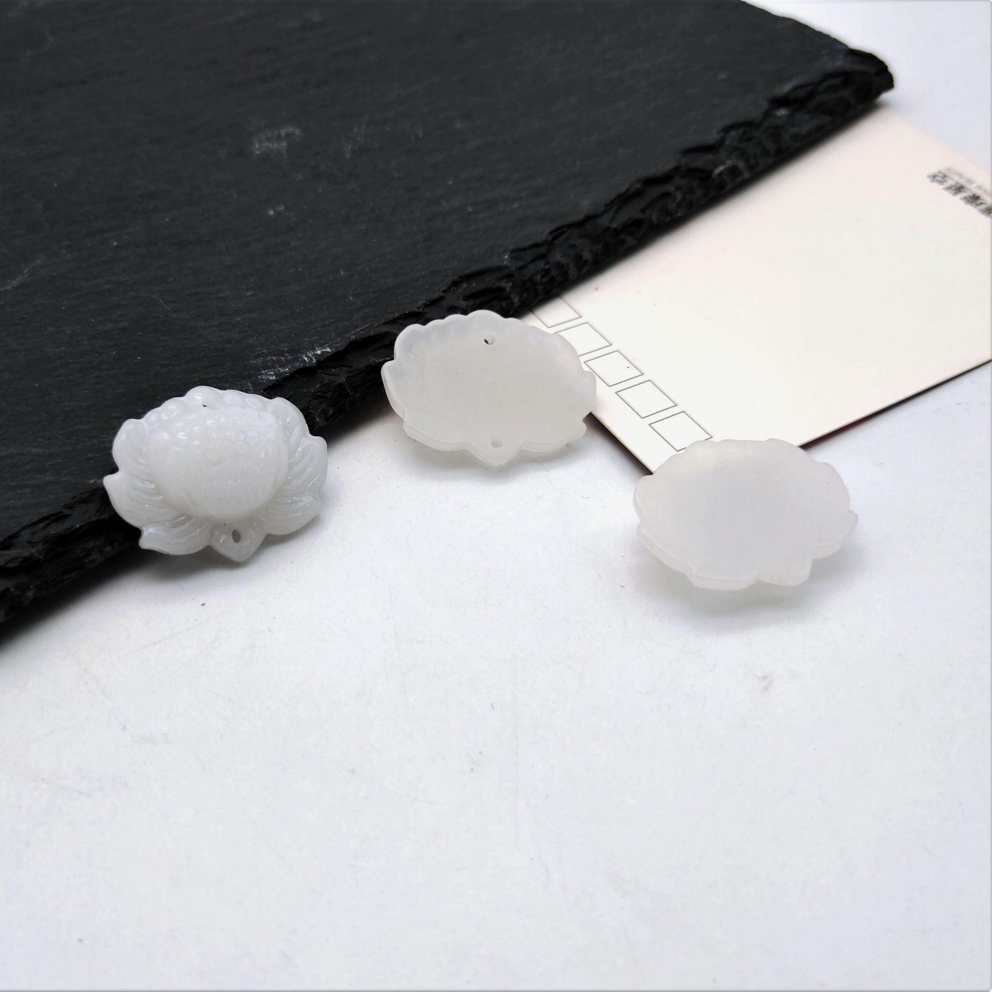 Hot-selling handmade diy ancient-style double-hole tassel material imitation jade resin lotus pendant, bracelet, pendant and accessory Application Scenario