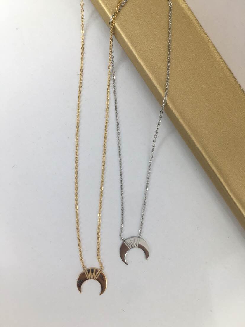 A simple and individual moon-shaped stainless steel necklace for women