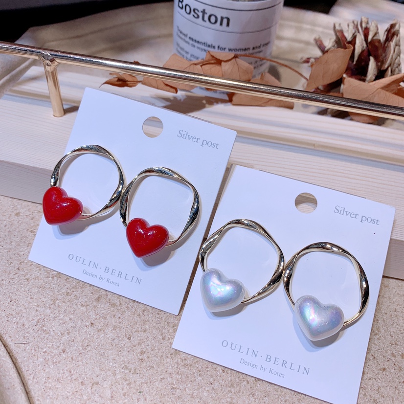 Character earrings with a heart full figure