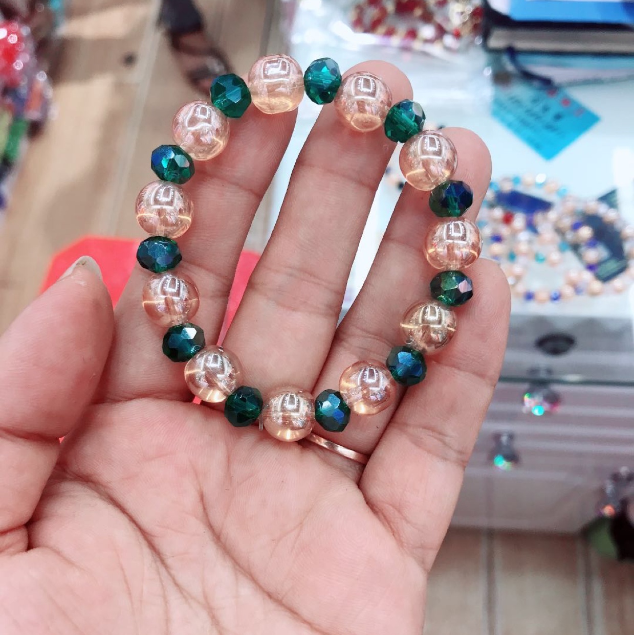 Amber gold bracelet with malachite green thumbnail