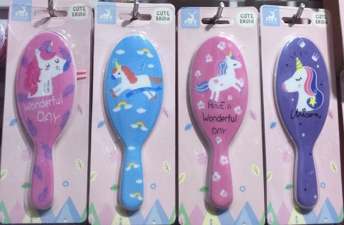 Plastic children's toy comb with card holder thumbnail