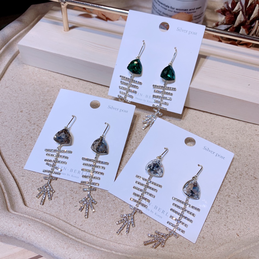 Fishbone character earrings thumbnail