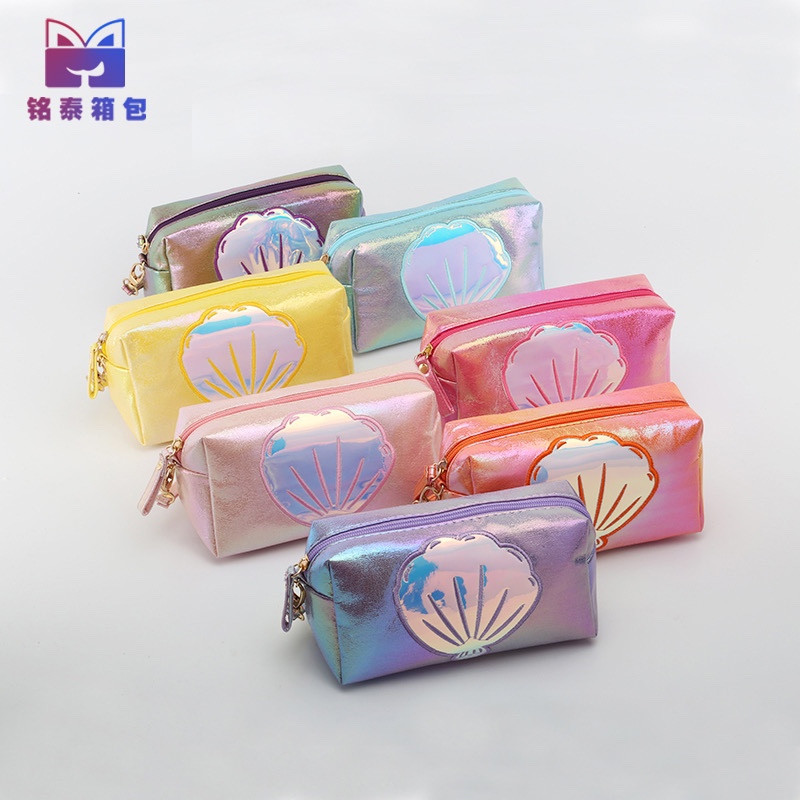 The popular foreign trade "Phantom Color Crack Prince Bag" is a copyrighted and patented "colorful fabric cosmetic bag" and a "shell handbag"