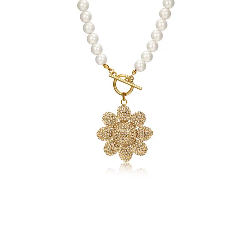 This unique and distinctive pearl OT pendant necklace is adorned with diamonds and sunflowers. It's an exaggerated and trendy necklace for women Application Scenario