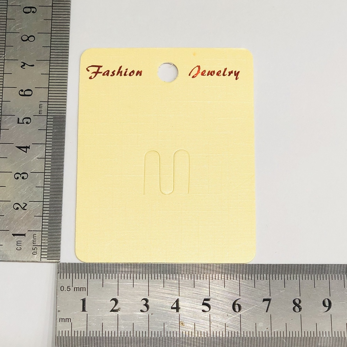 厂家直销纸质卡片饰品包装定制米黄莱尼胸针卡6*7.5产品图