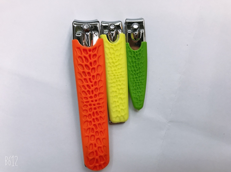 Three sets of nail scissors, one with a leather case, feel good, one 360 sets