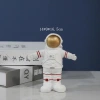 New creative astronaut figurines, Nordic cartoon astronaut resin handicrafts, "The Wandering Earth" desktop decorative items undefined