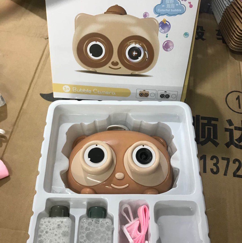 The brown eyeglasses bear fully automatic light and music bubble machine is selling well at street stalls details Picture