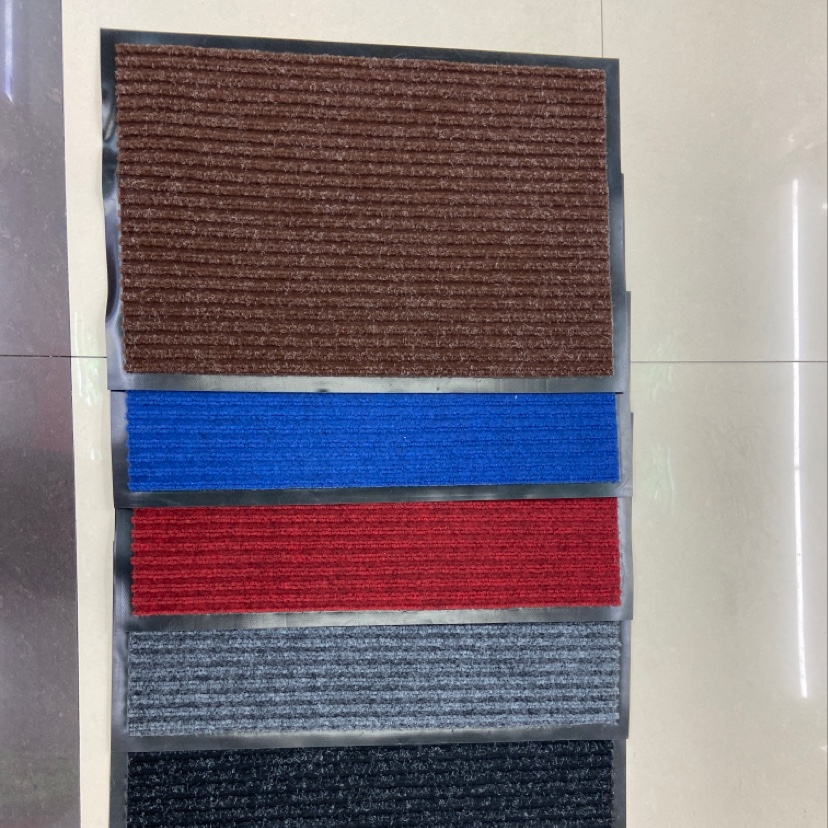 Double stripe embossed dust removal door mat