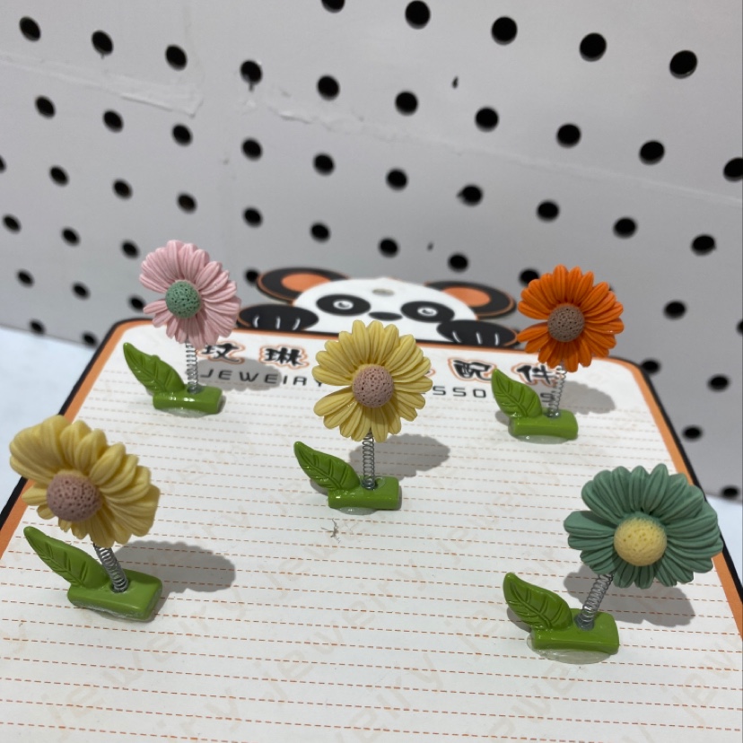Daisies with leaves